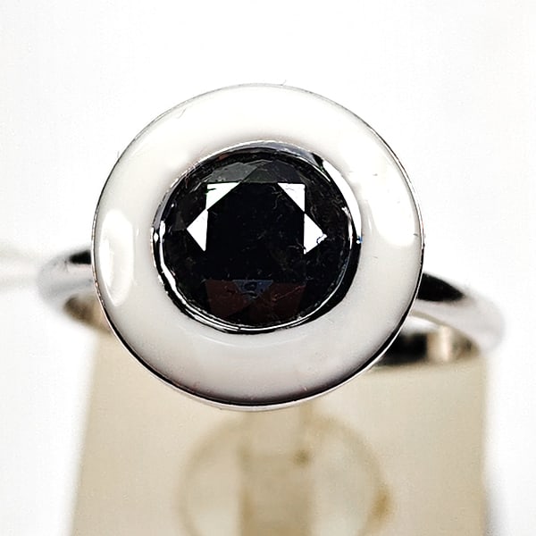Natural Diamond 1.48 Ct. 14 K White Gold 4.25 Grams Ring Size 6: Product ID: 502100071 Product Name: Natural Ring Weight: 1.48 CT. Size: 6 MM. Shape: Round Brilliant Cut Color: black Clarity:None Luster: Good Gems Origin: Belgium Treatment: Unheated Crystal Structu