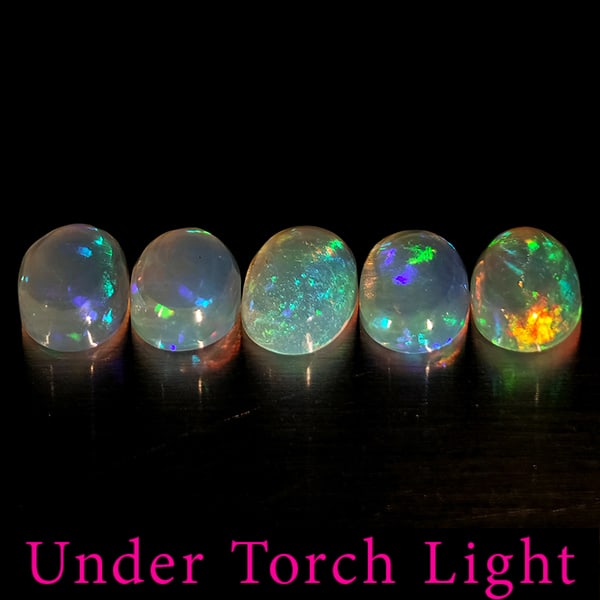Natural Multi Color Opal 1.58 Ct. 5 Pcs Oval Cabochon Shape 6 x 4 Mm Gemstones from Ethiopia: Product ID: 818728075 Product Name: Natural Opal Weight: 1.58 CT. Size: 6 x 4 x 2.7 MM. Shape: Oval Cabochon Color: Multi-Color Clarity:Semi - Transparent Luster: Good Gems Origin: Ethiopia Treatment: