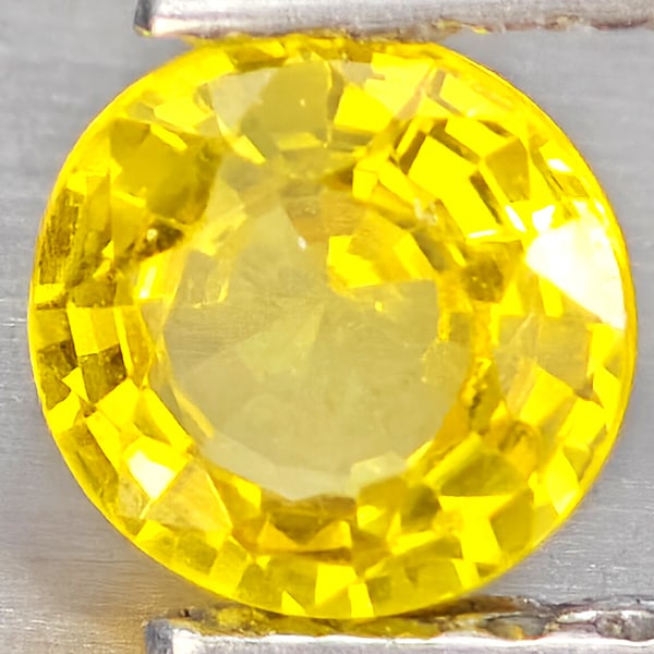 Natural Yellow Sapphire 0.44 Ct. Round Shape 4.5 Mm Gemstones From Thailand: Product ID: 806162955 Product Name: Natural Yellow Sapphire Weight: 0.44 CT. Size: 4.5 x 4.5 x 2.5 MM. Shape: Round Shape Color: Yellow Clarity:VSI Luster: Good Gems Origin: Thailand Treatment: Heated