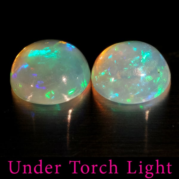Natural Multi Color Opal 1.50 Ct. 2 Pcs. Round Cabochon Shape 7 Mm. Gemstones From Ethiopia: Product ID: 818728209 Product Name: Natural Opal Weight: 1.50 CT. Size: 7 x 7 x 3.5 MM. Shape: Round Cabochon Color: Multi-Color Clarity:Semi - Transparent Luster: Good Gems Origin: Ethiopia Treatment