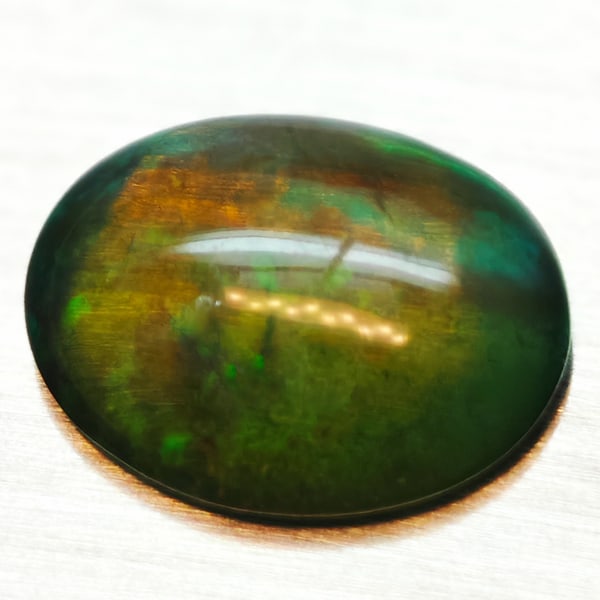 Natural Multi-Color Opal 0.95 Ct. Oval Cabochon Shape 9.2 x 7.2 Mm Gemstone From Ethiopia (1 of 3)