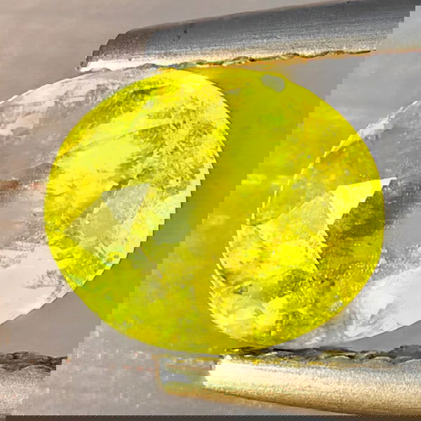 Natural Multi-Color With Rainbow Spark Sphene 1.05 Ct. Oval Shape 6.8 x 5.8 Mm Gemstone From (1 of 3)