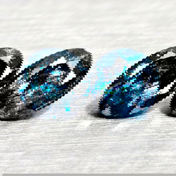 Natural Blue Loose Diamond 0.17 Ct. 2 Pcs Round Diamond Cut 2.8 Mm From Belgium: Product ID: 502100362 Product Name: Natural Natural Diamond Weight: 0.17 CT. Size: 2.8 x 2.8 x 1.6 MM. Shape: Round Diamond Cut Color: Blue Clarity:SI1 Luster: Good Gems Origin: Belgium Treatment: Tre