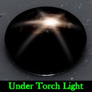 Natural Black Star Sapphire 6 Rays 2.23 Ct. Oval Cabochon Shape 8.9 x 6.9 Mm Gemstone from Thailand: Product ID: 806135352 Product Name: Natural Star Sapphire Weight: 2.23 CT. Size: 8.9 x 6.9 x 3.4 MM. Shape: Oval Cabochon Color: Black Clarity:Opaque Luster: Good 6 Rays Star Gems Origin: Thailand Tre