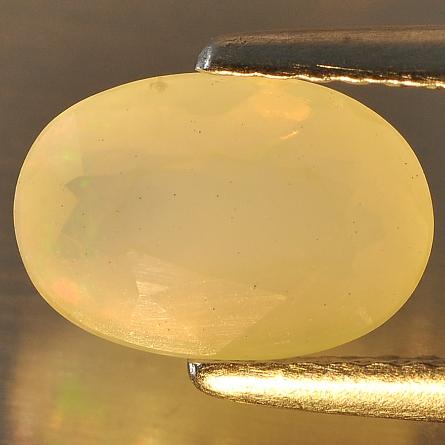 Natural White Color Opal 1.15 Ct. Oval Shape 9.1 x 6.3 Mm Gemstone from Ethiopia (1 of 3)