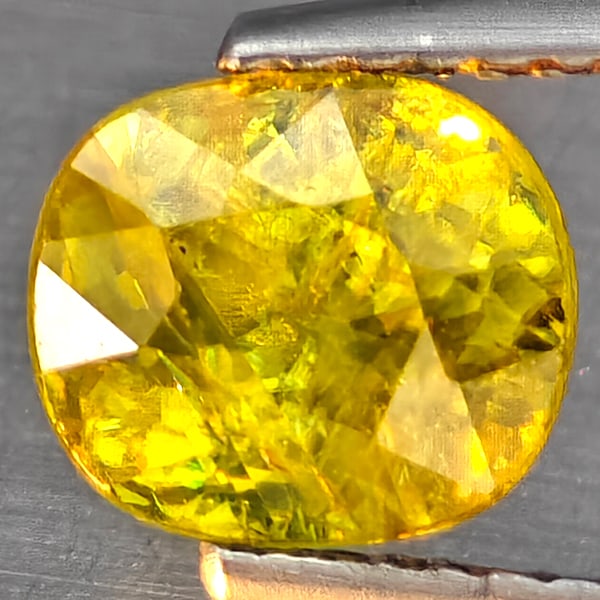 Natural Multi-Color With Rainbow Spark Sphene 1.65 Ct. Oval Shape 7.2 x 6.2 Mm Gemstone From (1 of 3)