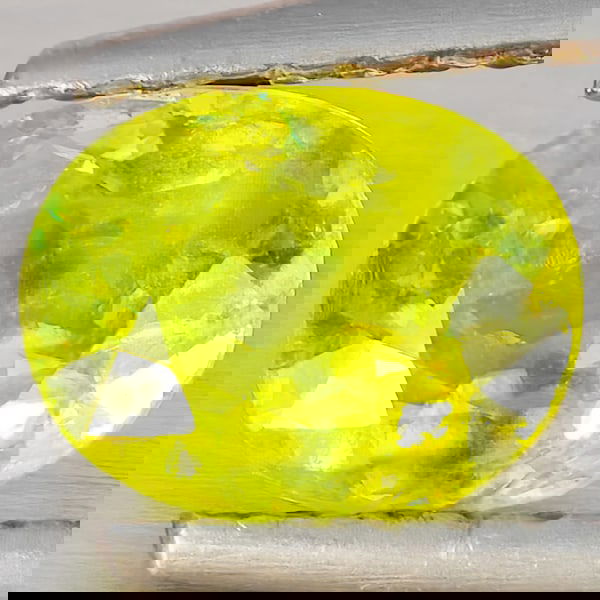 Natural Multi-Color With Rainbow Spark Sphene 0.95 Ct. Oval Shape 6.8 x 5.3 Mm Gemstone From (1 of 3)