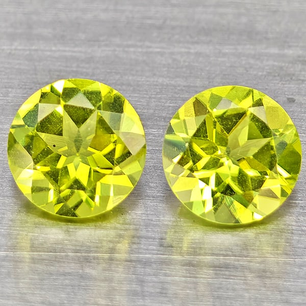 Natural Green Peridot 1.22 Ct. 2 Pcs. Round Shape 5.3 Mm. Gemstones from Pakistan: Product ID: 805317663 Product Name: Natural Peridot Weight: 1.22 CT. Size: 5.3 x 5.3 x 3.2 MM. Shape: Round Color: Green Clarity:VSI Luster: Good Gems Origin: Pakistan Treatment: Unheated Crystal Stru