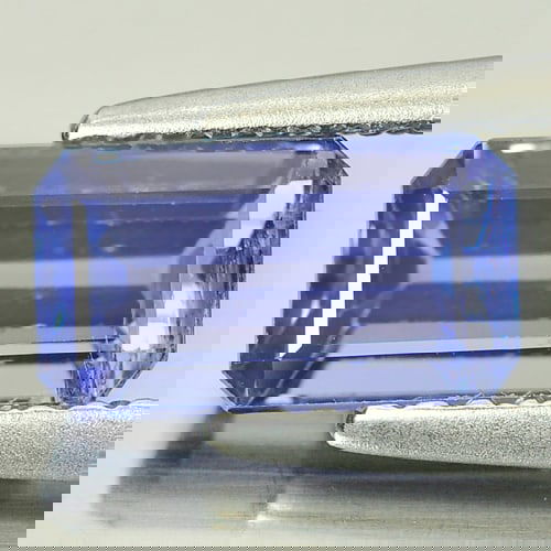 Natural Violetish Blue Tanzanite 1.73 Ct. Octagon Shape 8.5 x 4.8 Mm Gemstone from Tanzania: Product ID: 807009247 Product Name: Natural Tanzanite Weight: 1.73 CT. Size: 8.5 x 4.8 x 4 MM. Shape: Octagon Color: Violetish Blue Clarity:VSI Luster: Good Gems Origin: Tanzania Treatment: Heated Cry