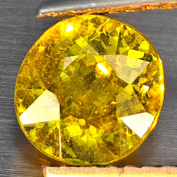 Natural Multi-Color With Rainbow Spark Sphene 1.62 Ct. Oval Shape 7 x 6.7 Mm Gemstone From (1 of 3)