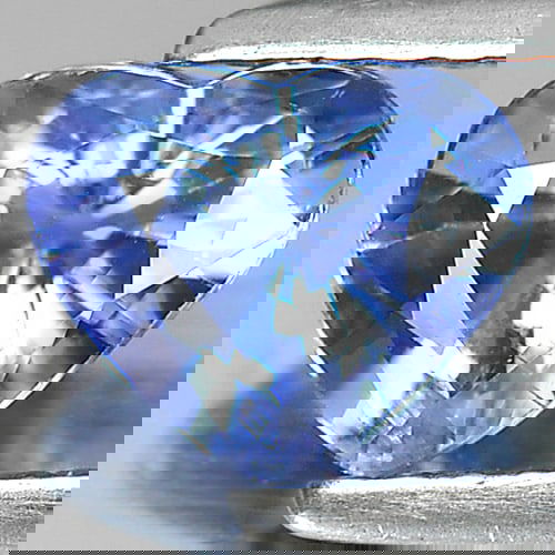 Natural Violetish Blue Tanzanite 1.07 Ct. VVS Heart Shape 7.2 x 6 Mm Gemstone from Tanzania: Product ID: 807004156 Product Name: Natural Tanzanite Weight: 1.07 CT. Size: 7.2 x 6 x 4 MM. Shape: Heart Color: Blue Clarity:VVS Luster: Very Good Gems Origin: Tanzania Treatment: Heated Crystal Stru