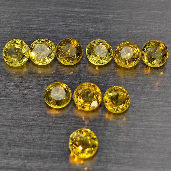 Natural Greenish Yellow Titanium Sphene Rainbow Spark 1.93 Ct. 10 Pcs Round Shape 4.4 Mm Gemstones: Product ID: 806509355 Product Name: Natural Sphene Weight: 1.93 CT. Size: 4 x 4 x 2.3 MM. Shape: Round Shape Color: Greenish Yellow Titanium Ranibow Spark Clarity:SI1 Luster: Good Gems Origin: Madagas
