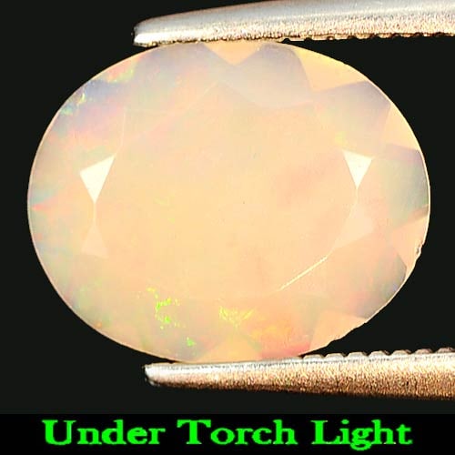 Natural Multi Color Opal 1.24 Ct. Oval Shape 11 x 9 Mm Gemstone From Ethiopia: Product ID: 818725059 Product Name: Natural Opal Weight: 1.24 CT. Size: 11 x 9 x 3.4 MM. Shape: Oval Color: Multi Color Clarity:Semi - Transparent Luster: Iridescent Gems Origin: Ethiopia Treatment: U