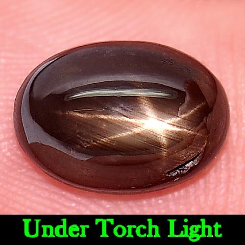 Natural Black Star Sapphire 6 Rays 3.56 Ct. Oval Cabochon Shape 10 x 7.1 Mm Gemstone From Thailand: Product ID: 806156526 Product Name: Natural Star Sapphire Weight: 3.56 CT. Size: 10 x 7.1 x 4.9 MM. Shape: Oval Cabochon Color: Black Clarity:Opaque Luster: Good 6 Rays Star Gems Origin: Thailand Trea