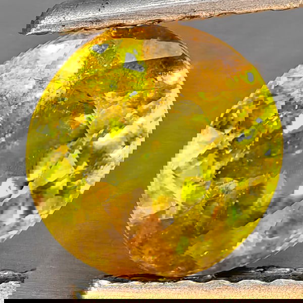 Natural Multi-Color With Rainbow Spark Sphene 1.32 Ct. Round Shape 6.8 Mm Gemstone From Madagascar: Product ID: 806509124 Product Name: Natural Sphene Weight: 1.32 CT. Size: 6.8 x 6.8 x 4 MM. Shape: Round Shape Color: Multi-Color Clarity:SI1 Luster: Good Gems Origin: Madagascar Treatment: Unheated C