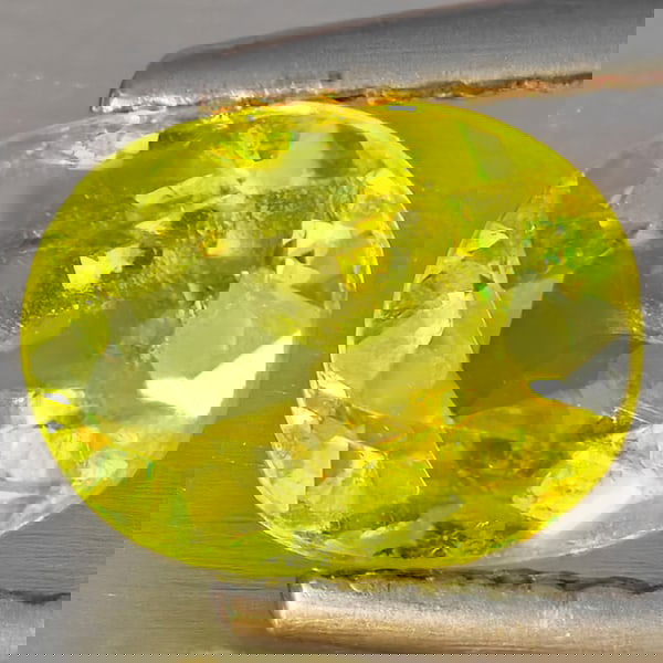 Natural Multi-Color With Rainbow Spark Sphene 1.31 Ct. Oval Shape 7.8 x 5.9 Mm Gemstone From: Product ID: 806509160 Product Name: Natural Sphene Weight: 1.31 CT. Size: 7.8 x 5.9 x 3.7 MM. Shape: Oval Shape Color: Multi-Color With Rainbow Spark Clarity:SI1 Luster: Good Gems Origin: Madagascar T