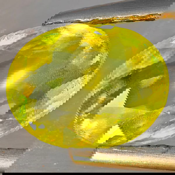 Natural Multi-Color With Rainbow Spark Sphene 1.18 Ct. Oval Shape 8.2 x 6.2 Mm Gemstone From (1 of 3)