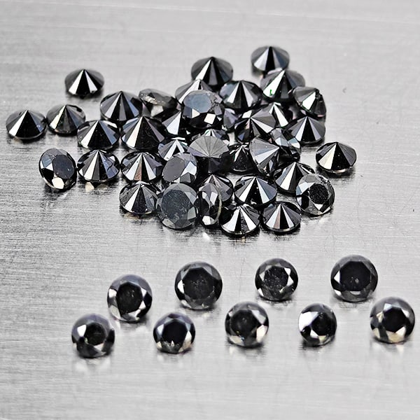 Natural Black Diamond 1.16 Ct. 50 Pcs Round Diamond Cut 1.8 Mm: Product ID: 502100499 Product Name: Natural Natural Diamond Weight: 1.16 CT. Size: 1.8 x 1.8 x 1.2 MM. Shape: Round Diamond Cut Color: Black Clarity:Opaque Luster: Good Gems Origin: Belgium Treatment: