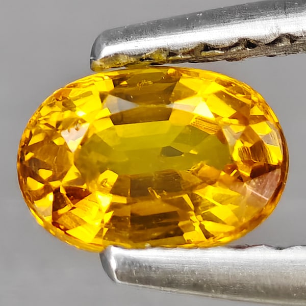 Natural Yellow Sapphire 0.65 Ct. Oval Shape 5.7 x 4.1 Mm Gemstone from Thailand (1 of 3)