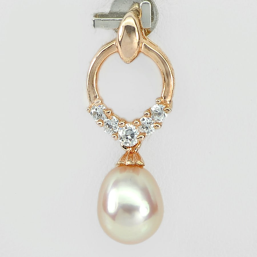 925 Sterling Silver Plated Rose Gold Pendant 1.99 G. Natural Orange Pink Pearl: Product ID: 207100553 Product Type: 925 Sterling Silver Fine Jewelry Jewelry Weight: 1.99 Grams. Gemstones Color: Orange Metal: Solid Silver 92.5%. Gemstone Detail: Center: Natural Orange Pink Pearl O