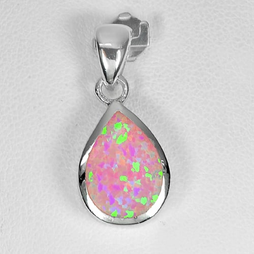 925 Sterling Silver Pendant 3.56 G. Pear Cabochon Created Multi Color Pink Opal: Product ID: 280130054 Product Name: Natural Fashion Jewelry Weight: 3.56 CT. Size: 25 x 11 Mm. MM. Shape: Pear Cabochon Color: Multi Color Pink Clarity:Opaque Luster: Good Gems Origin: Thailand Treatm