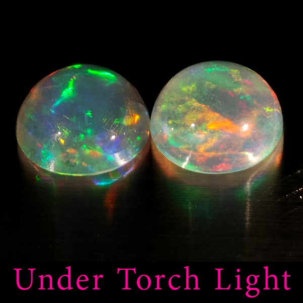 Natural Multi Color Opal 1.75 Ct. 2 Pcs Round Cabochon Shape 7 Mm Gemstones From Ethiopia: Product ID: 818728178 Product Name: Natural Opal Weight: 1.75 CT. Size: 7 x 7 x 3.7 MM. Shape: Round Cabochon Color: Multi-Color Clarity:Semi - Transparent Luster: Good Gems Origin: Ethiopia Treatment