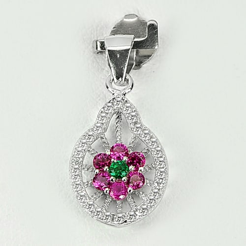 1.40 G. Flower Design Green Pink CZ Real 925 Sterling Silver Jewelry Pendant: Product ID: 280530225 Product Type: 925 Sterling Silver Fine Jewelry Jewelry Weight: 1.40 Grams. Gemstones Color: Silver Metal: Solid Silver 92.5%. Gemstone Detail: About 1.40 Grams. Round Green CZ Si