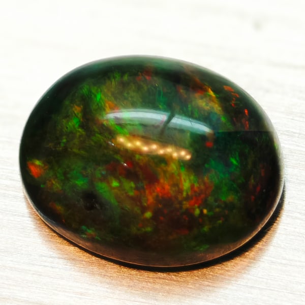 Natural Multi-Color Opal 1.65 Ct. Oval Cabochon Shape 9 x 7 Mm Gemstone From Ethiopia (1 of 3)