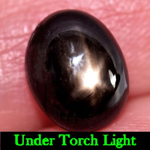 Natural Black Star Sapphire 3.95 Ct. Oval Cabochon Shape 9.5 x 7.4 Mm Gemstone From Thailand: Product ID: 806146157 Product Name: Natural Star Sapphire Weight: 3.95 CT. Size: 9.5 x 7.4 x 5.2 MM. Shape: Oval Cabochon Color: Black Clarity:Opaque Luster: Good 6 Rays Star Gems Origin: Thailand Tre
