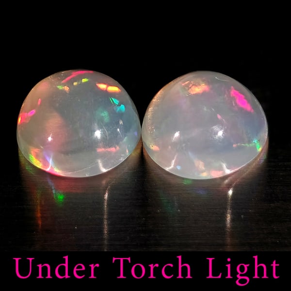 Natural Multi Color Opal 1.36 Ct. 2 Pcs Round Cabochon Shape 6.9 Mm Gemstones From Ethiopia: Product ID: 818728168 Product Name: Natural Opal Weight: 1.36 CT. Size: 6.9 x 6.9 x 3.7 MM. Shape: Round Color: Multi-Color Clarity:Semi - Transparent Luster: Good Gems Origin: Ethiopia Treatment: