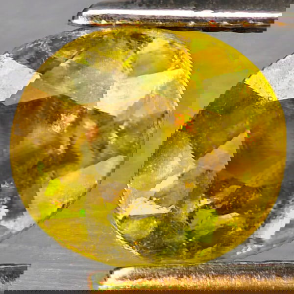 Natural Multi Color Titanium Rainbow Spark Sphene 1.80 Ct. Oval Shape 7.5 x 6.7 Mm Gemstone From: Product ID: 806509077 Product Name: Natural Sphene Weight: 1.80 CT. Size: 7.5 x 6.7 x 4.5 MM. Shape: Oval Color: Multi-Color Clarity:SI1 Luster: Good Gems Origin: Madagascar Treatment: Unheated