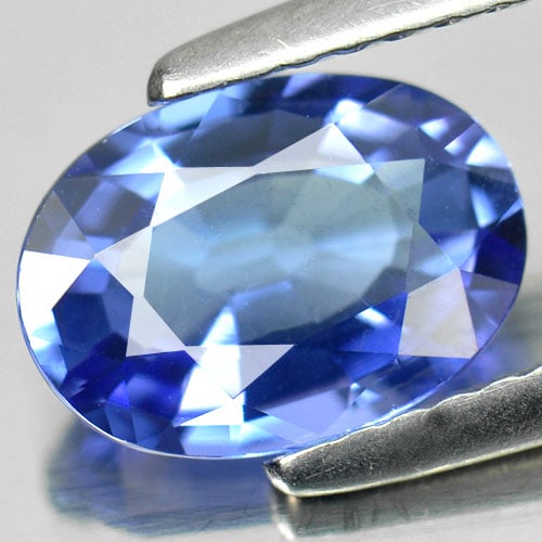 Natural Blue Tanzanite 1.53 Ct. Clean Oval Shape 8.1 x 5.6 Mm. Gemstone From Tanzania: Product ID: 807006589 Product Name: Natural Tanzanite Weight: 1.53 CT. Size: 8.1 x 5.6 x 2.9 MM. Shape: Oval Color: Blue Clarity:IF Luster: Very Good Gems Origin: Tanzania Treatment: Heated Crystal