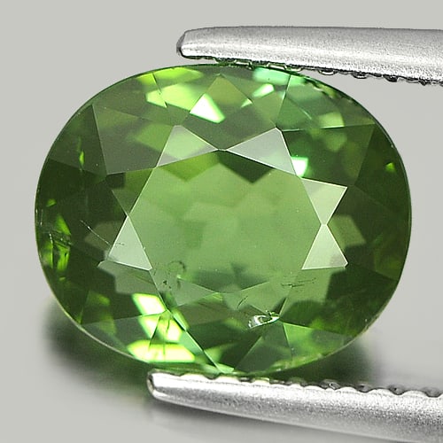 Natural Green Tourmaline 2.86 Ct. Oval Shape 9.4 x 7.8 Mm. Unheated Gemstone From Nigeria: Product ID: 807232500 Product Name: Natural Tourmaline Weight: 2.86 CT. Size: 9.4 x 7.8 x 5.2 MM. Shape: Oval Color: Green Clarity:VSI Luster: Very Good Gems Origin: Nigeria Treatment: Unheated