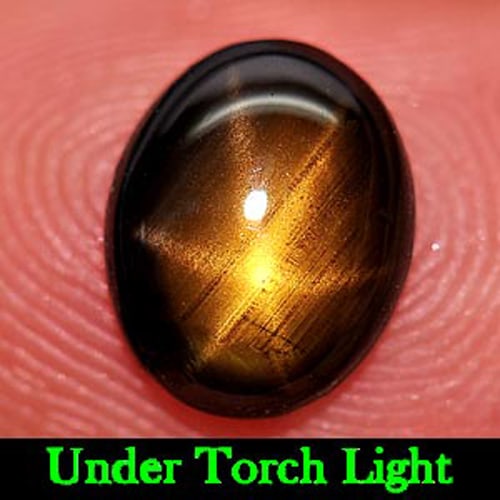 Certified Natural Golden Star Sapphire 6 Ray 1.63 Ct. Oval Cabochon Shape 8.39 x 6.73 Mm Gemstone: Product ID: 806149973 Product Name: Natural Star Sapphire Weight: 1.63 CT. Size: 6.73 x 8.39 x 2.52 MM. Shape: Oval Cabochon Color: Yellow Clarity:Opaque Luster: Good 6 Ray Star Gems Origin: Thailand