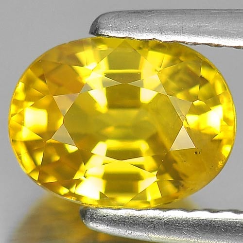 Natural Yellow Sapphire 1.66 Ct. Oval Shape 7.8 x 6 Mm Gemstone From Thailand: Product ID: 806151571 Product Name: Natural Yellow Sapphire Weight: 1.66 CT. Size: 7.8 x 6 x 4.1 MM. Shape: Oval Color: Yellow Clarity:SI2 Luster: Good Gems Origin: Thailand Treatment: Heated Crystal