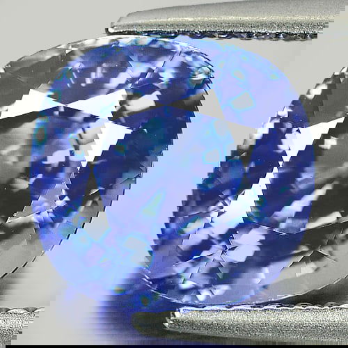 Natural Violetish Blue Tanzanite 3.24 Ct. Clean Cushion Shape 8.73 x 8.43 Mm. Gemstone From Tanzania: Product ID: 807006195 Product Name: Natural Tanzanite Weight: 3.24 CT. Size: 8.73 x 8.43 x 6.09 MM. Shape: Cushion Color: Blue Clarity:IF Luster: Very Good Gems Origin: Tanzania Treatment: Heated Crys