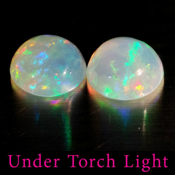 Natural Multi Color Opal 1.45 Ct. 2 Pcs Round Cabochon Shape 6.9 Mm Gemstones From Ethiopia: Product ID: 818728273 Product Name: Natural Opal Weight: 1.45 CT. Size: 6.9 x 6.9 x 3.2 MM. Shape: Round Color: Multi-Color Clarity:Semi - Transparent Luster: Good Gems Origin: Ethiopia Treatment: Unh
