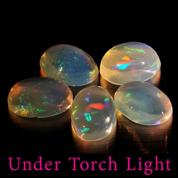 Natural Multi Color Opal 1.41 Ct. 5 Pcs Oval Cabochon Shape 6 x 4 Mm Gemstones From Ethiopia: Product ID: 818728084 Product Name: Natural Opal Weight: 1.41 CT. Size: 6 x 4.2 x 2.5 MM. Shape: Oval Cabochon Color: Multi-Color Clarity:Semi - Transparent Luster: Good Gems Origin: Ethiopia Treatmen