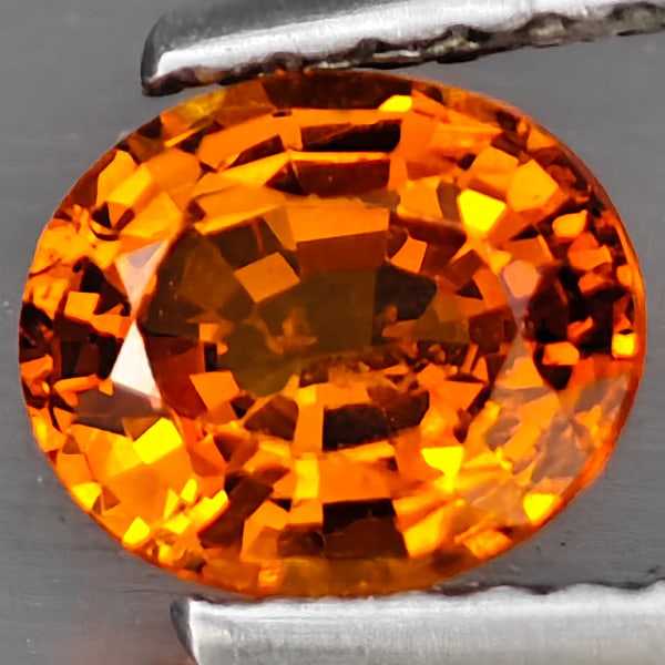 Natural Orange Spessartine Garnet 0.83 Ct. Oval Shape 6.2 x 5.2 Mm Gemstone From Namibia: Product ID: 802937827 Product Name: Natural Spessartine Weight: 0.83 CT. Size: 6.2 x 5.2 x 3.6 MM. Shape: Oval Shape Color: Orange Clarity:VSI Luster: Good Gems Origin: Namibia Treatment: Unheated Cry