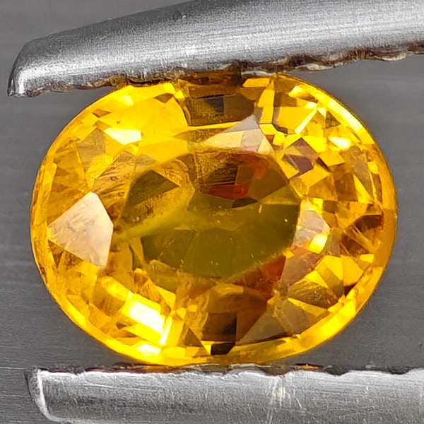 Natural Orange Songea Sapphire 0.52 Ct. Oval Shape 5.2 x 4.2 Mm Gemstone from Tanzania (1 of 3)