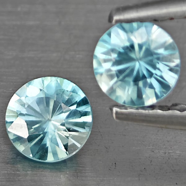 Natural Blue Zircon 0.95 Ct. 2 Pcs Round Diamond Cut 4.6 Mm Gemstone from Cambodia: Product ID: 807743266 Product Name: Natural Gemstones Weight: 0.95 CT. Size: 4.6 x 4.6 x 3 MM. Shape: Round Diamond Cut Color: Blue Clarity:SI1 Luster: Good Gems Origin: Cambodia Treatment: Heated Cry