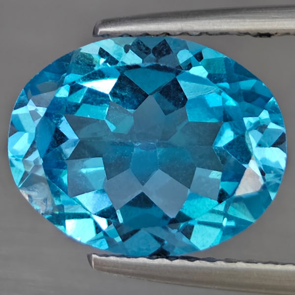 Natural Swiss Blue Topaz 4.21 Ct. Oval Shape 12.2 x 9.8 Mm Gemstone from Brazil (1 of 3)