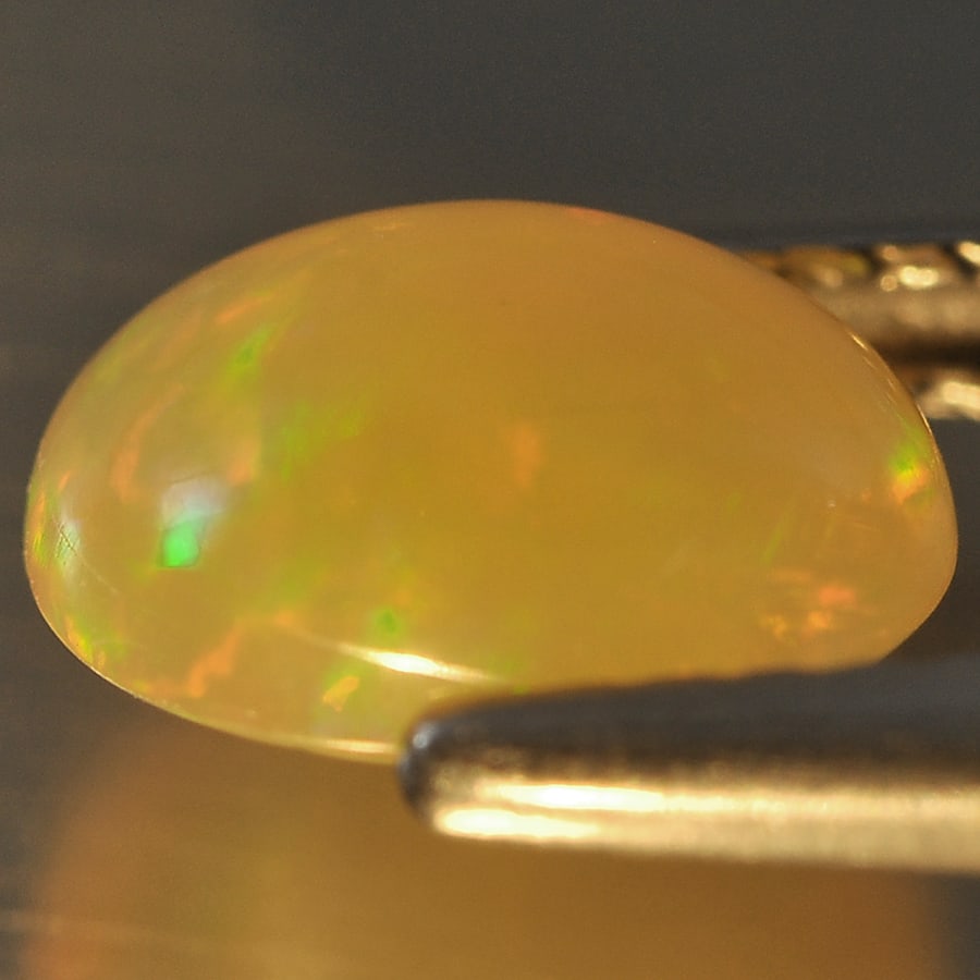 Natural Multi Color Opal 1.11 Ct. Oval Cabochon Shape 8.4 x 6.7 Mm Gemstone from Ethiopia (1 of 3)
