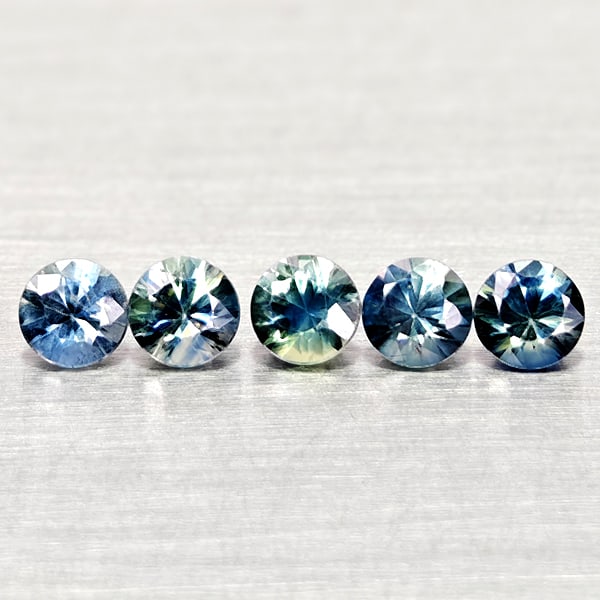 Natural Multi Color Sapphire 0.86 Ct. 5 Pcs Round Diamand Cut 3.3 Mm Gemstones From Tanzania: Product ID: 806162172 Product Name: Natural Green Sapphire Weight: 0.86 CT. Size: 3.3 x 3.3 x 2.3 MM. Shape: Round Diamond Cut Color: Fancy Color Clarity:VSI Luster: Very Good Gems Origin: Tanzania Tr