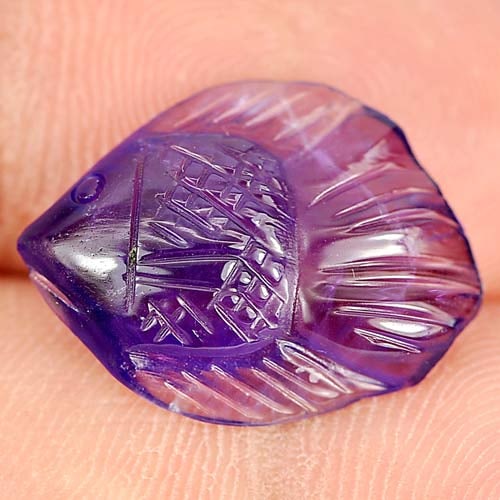 Natural Violet Amethyst 6.21 Ct. Fish Carving Shape 18.1 x 13.6 Mm Gemstone from Brazil: Product ID: 810303978 Product Name: Natural Amethyst Weight: 6.21 CT. Size: 18.1 x 13.6 x 5.6 MM. Shape: Fish Carving Color: Violetish Blue Clarity:Semi - Transparent Luster: Good Gems Origin: Brazil