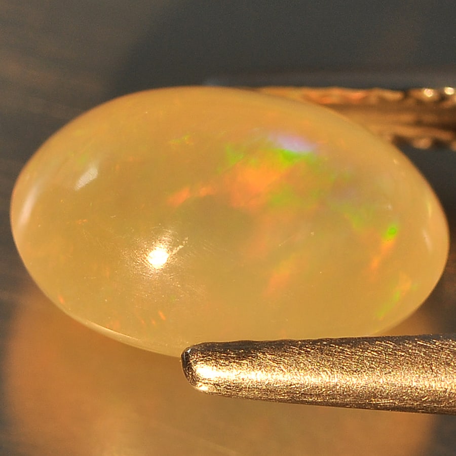 Natural Multi Color Opal 1.44 Ct. Oval Cabochon Shape 9.4 x 6.8 Mm Gemstone From Ethiopia (1 of 3)