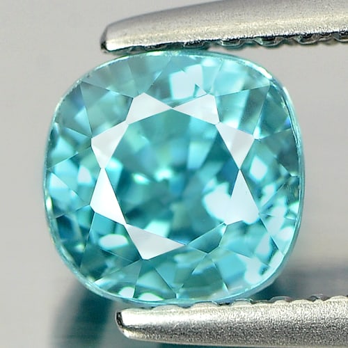 Natural Blue Zircon 1.73 Ct. Cushion Shape 6 x 5.8 Mm Gemstone from Cambodia: Product ID: 807727011 Product Name: Natural Zircon Weight: 1.73 CT. Size: 6 x 5.8 x 4.7 MM. Shape: Cushion Color: Blue Clarity:VSI Luster: Good Gems Origin: Cambodia Treatment: Heated Crystal Structur