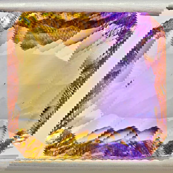 Natural Bi Color Ametrine 8.94 Ct. Octagon Concave Cut 13.5 x 12.5 Mm Gemstone From Bolivia: Product ID: 800408545 Product Name: Natural Ametrine Weight: 8.94 CT. Size: 13.5 x 12.5 x 7.1 MM. Shape: Octagon Concave Cut Color: Bi Color Clarity:VVS - VSI Luster: Very Good Gems Origin: Bolivia Tr