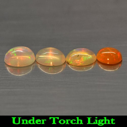 Natural Multi-Color Opal 1.22 Ct. 4 Pcs Oval Cabochon Shape 6.2 x 4.3 Mm Gemstone From Ethiopia: Product ID: 818723046 Product Name: Natural Opal Weight: 1.22 CT. Size: 6.2 x 4.3 x 3.2 MM. Shape: Oval Cabochon Color: Multi Color Clarity:Semi - Transparent Luster: Strong Iridescent Gems Origin: Et