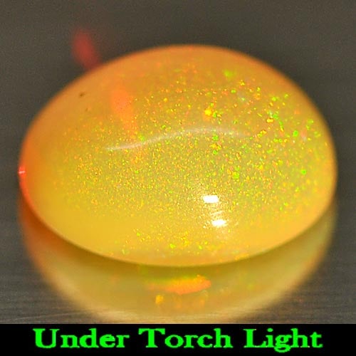 Natural Multi Color Opal 0.96 Ct. Oval Cabochon Shape 8.1 x 6.1 Mm Gemstone From Ethiopia: Product ID: 818725556 Product Name: Natural Opal Weight: 0.96 CT. Size: 8.1 x 6.1 x 4 MM. Shape: Oval Cabochon Color: Multi Color Clarity:Semi - Transparent Luster: Iridescent Gems Origin: Ethiopia Tr